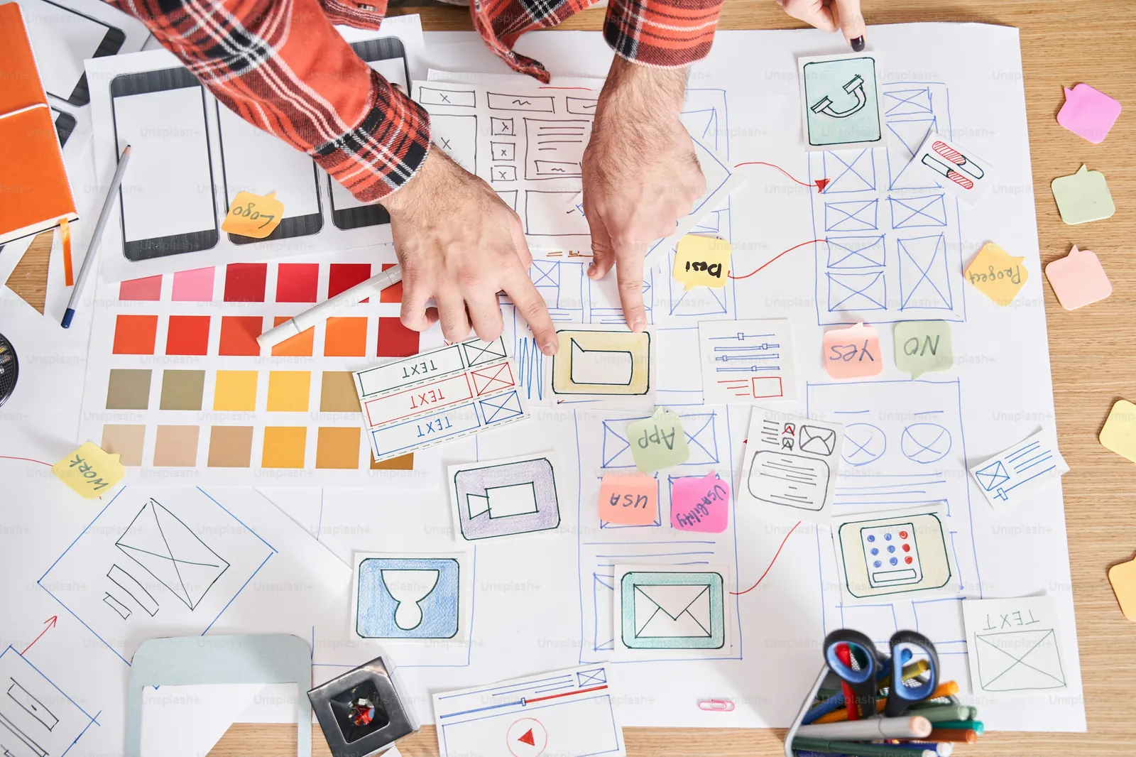 A design workspace with colour swatches and notes